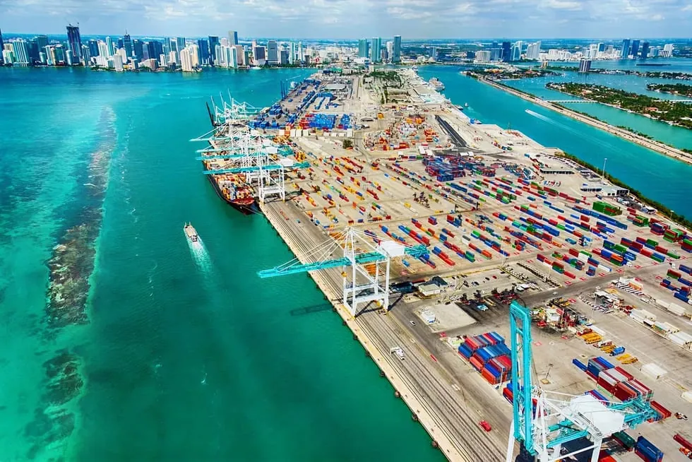 Aerial view of a shipping port loading vehicles for export